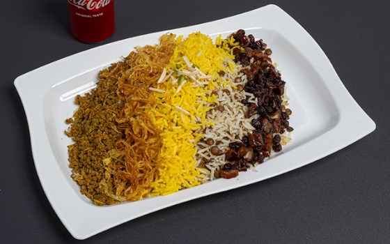 عدس پلو با گوشت و کشمش و خرما